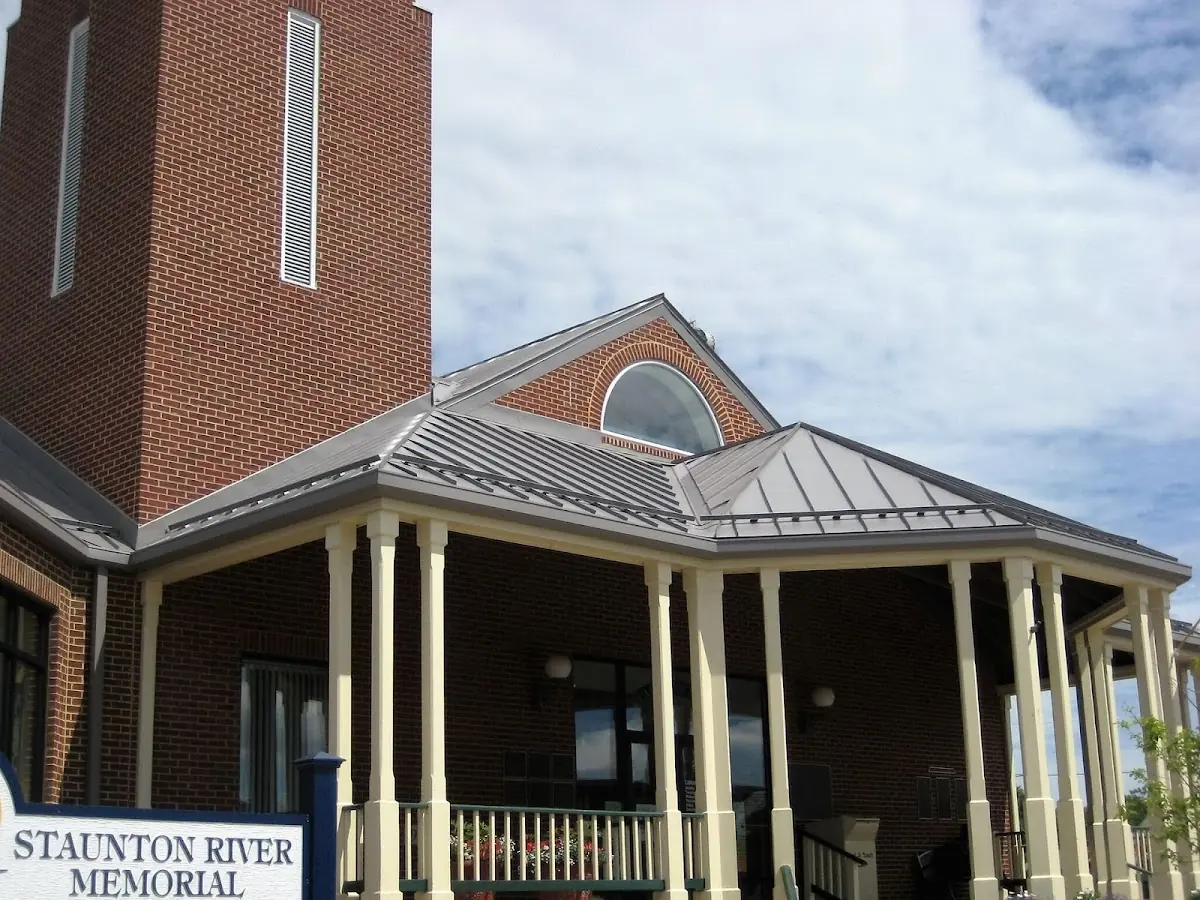Skilled roofing craftsmen working on a residential roof in Rockdale